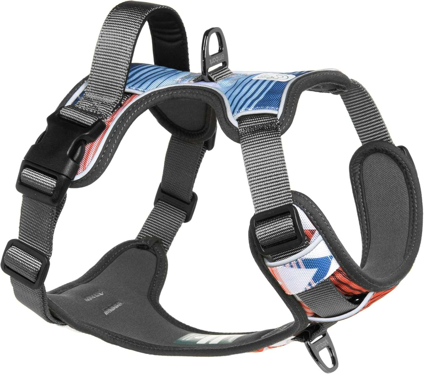 Small dog wearing Embark Adventure no-pull harness with reflective trim and gel-lined handle